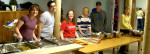 Left to right, Elyse, Mike, Emily, Andi, Brad, Lindsey, and Aggi in the kitchen.